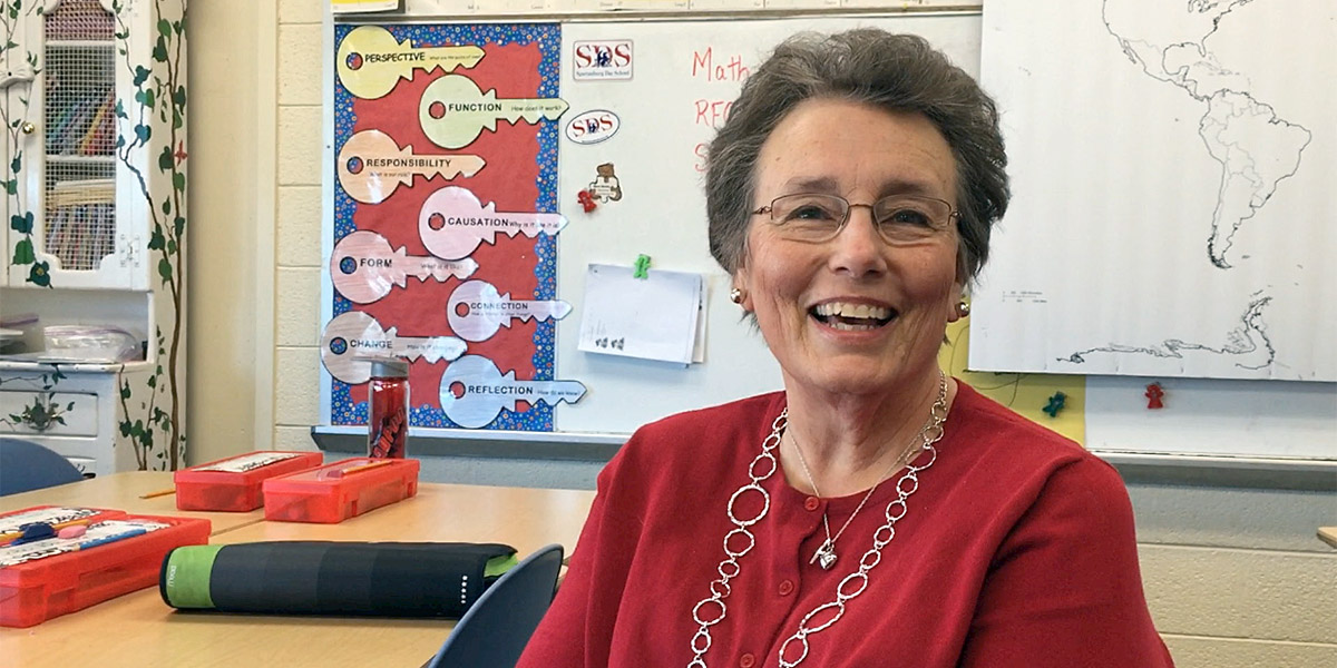 Heart attack survivor, Mary Steele, sits in her former classroom at Spartanburg Day School