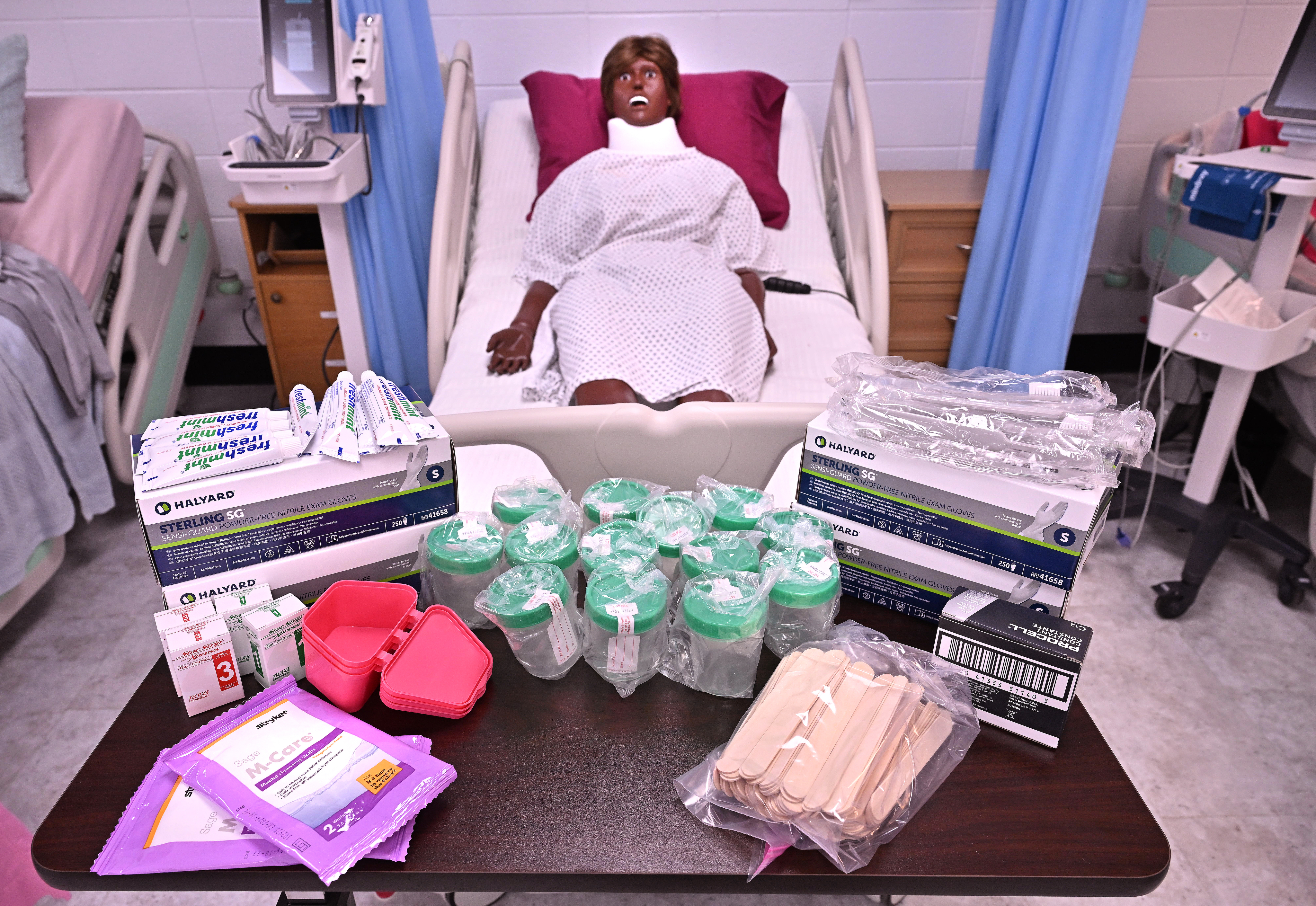 A manikin and essential medical equipment to help local career center students learn.